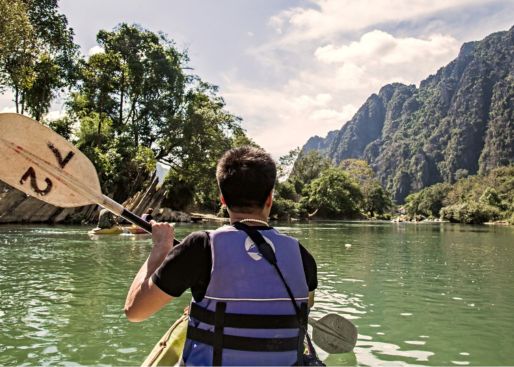 Anouvong cruise guests kayak on the Mekong River